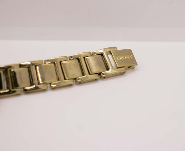Luxury Gold-tone DKNY Designer Watch for Women Covered in Gemstones ...
