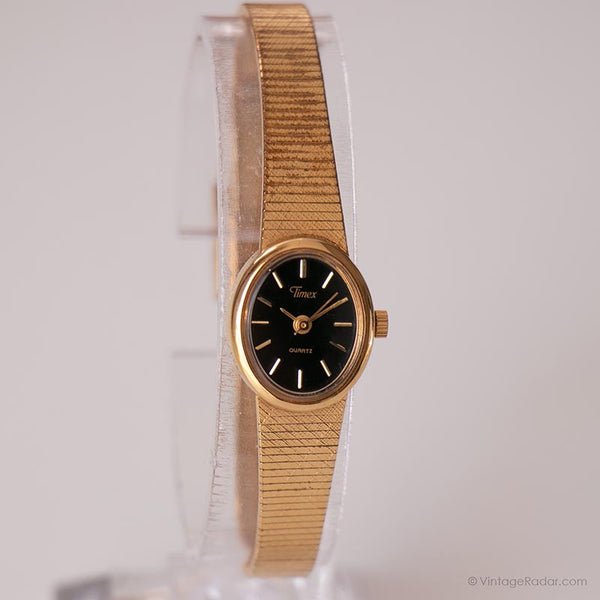Vintage pequeño ovalado Timex reloj | Tón de oro de dial negro reloj para ella