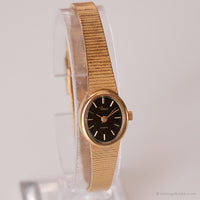 Minuscolo ovale vintage Timex Guarda | Dial quadrante nero orologio da tono d'oro per lei