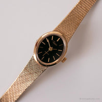Quadrante nero vintage Timex Guarda | Elegante orologio da tono d'oro