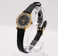 Quartz Eric Vintage reloj para mujeres con dial negro y números romanos