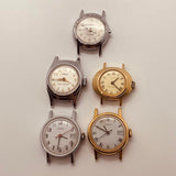 Lote de 5 de los 80 Windup Timex Relojes para piezas y reparación: no funciona