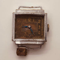 1950 fond acier inoxidable francés reloj Para piezas y reparación, no funciona